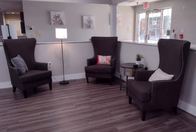 Pine Lodge Assisted Living - interior - three brown armchairs