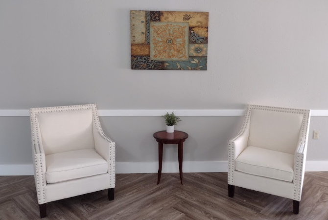 Pine Lodge Assisted Living - interior - two white armchairs